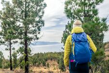 Hiking Woman With Backpack Looking At Inspirational Mountains La Stock Photography