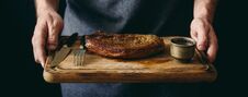 Man Holding Grilled Beef Steak Spices Cutting Board Royalty Free Stock Photos Man Holding Grilled Beef Steak Spices Cutting Board Royalty Free Stock Photos