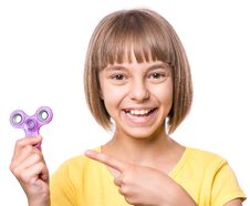 Girl With Spinner Royalty Free Stock Images
