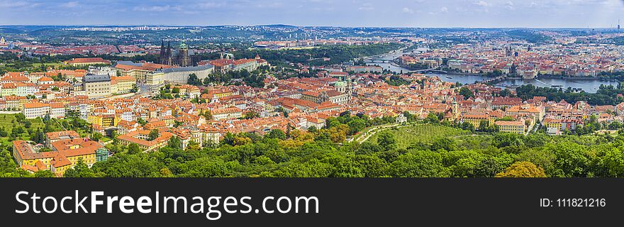 Aerial view of the Old Town and Charles Bridge over Vltava river in Prague, Czech Republic / Panoramic Shot Of Old Town And City Center In Prague