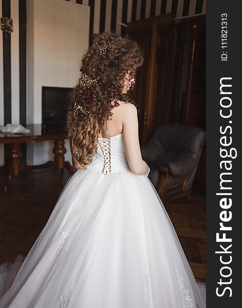 Hairstyle of a young beautiful bride