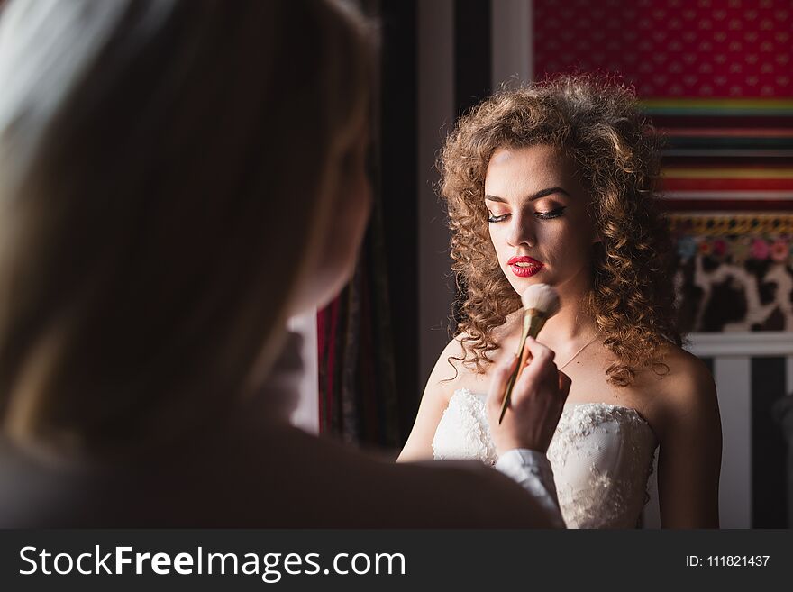 Beautiful And Young Bride Doing Makeup In The Morning