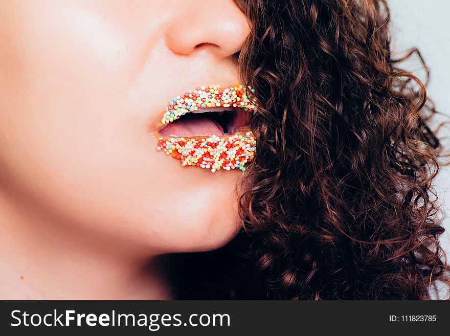 Woman With Sprinkle On Lips