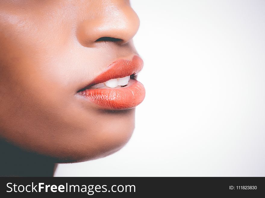 Woman Wearing Orange Lipstick