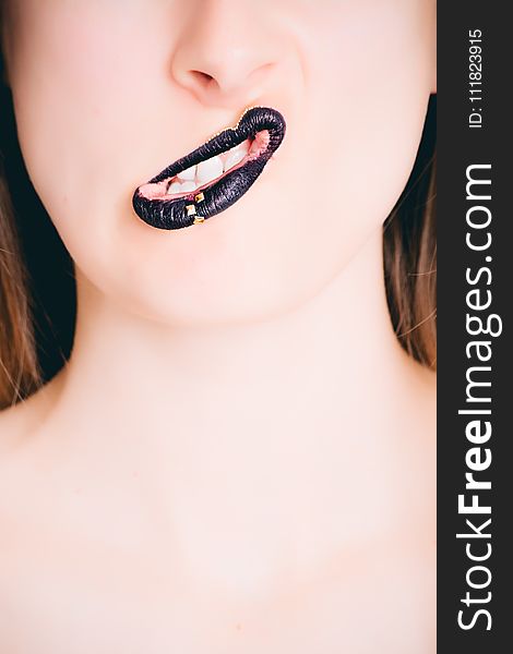 Woman&#x27;s Black Lipstick