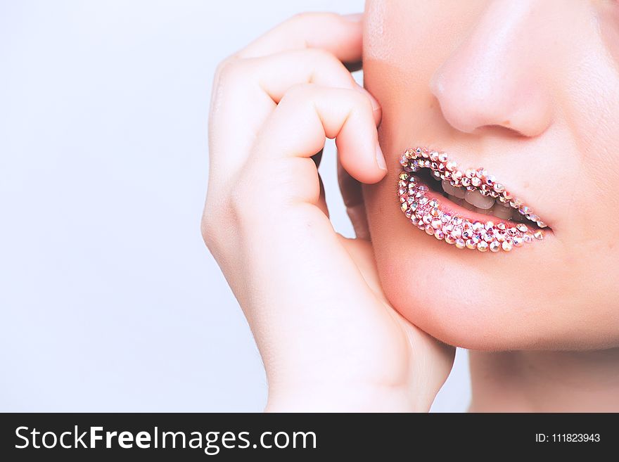 Woman With Gray Beaded Lipstick Close-up Photography