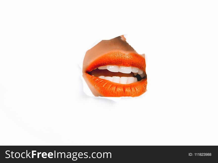 Photography of Woman&#x27;s Orange Lip
