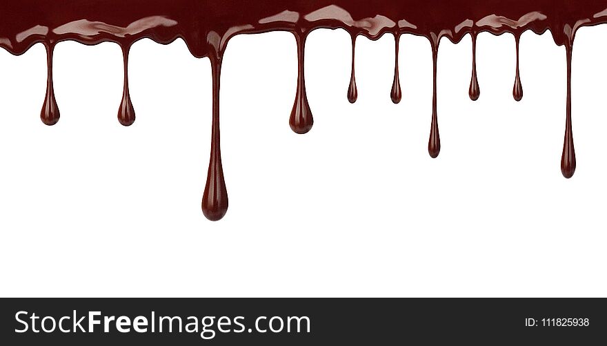 Melted chocolate dripping isolated on white background. Pouring, melting. Melted chocolate dripping isolated on white background. Pouring, melting.