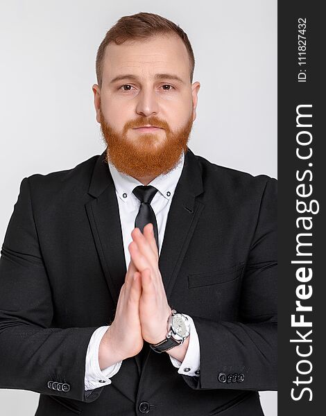 Elegant successful man in suit. Business man standing and looking at the camera. Elegant successful man in suit. Business man standing and looking at the camera