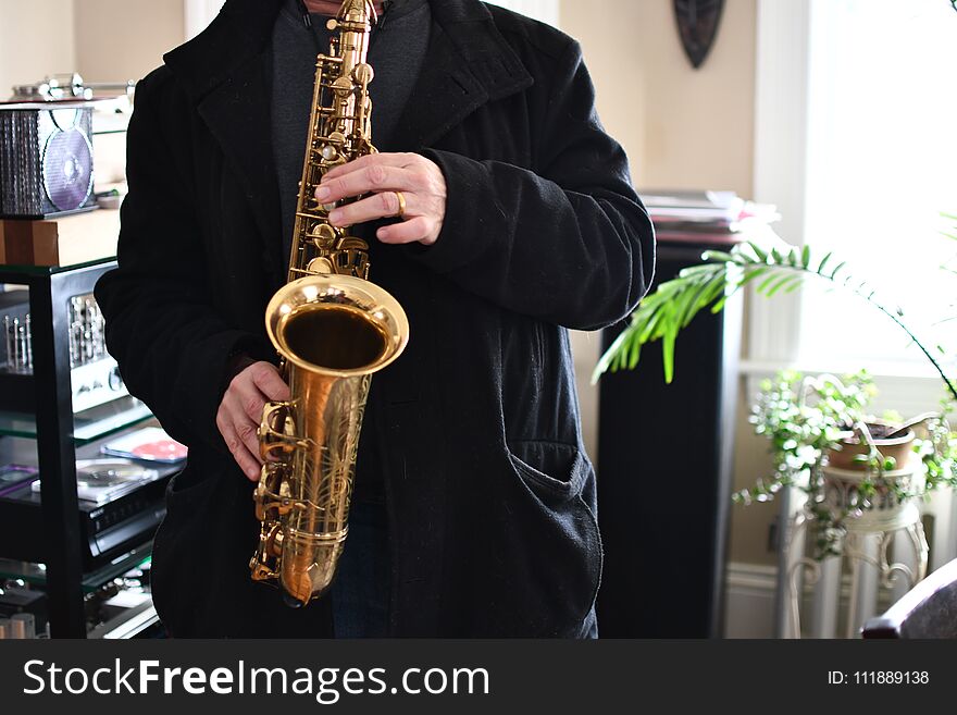 Senior Man Play Saxophone