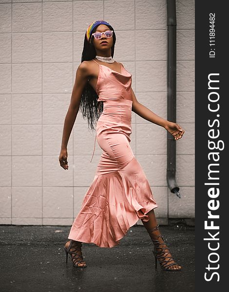 Photo Of Woman In Pink Spaghetti Strap Top And Pink Long Skirt