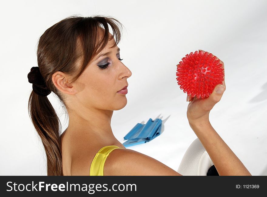 A Young model holding a spike ball. A Young model holding a spike ball