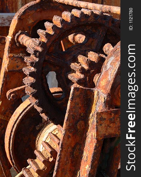 Rusty gears of an old boat winch