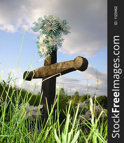 This crucifix is a typical grave monument of catholic village people in PtrukÅ¡a in East-Slovakia. It is made of wood and represents the beauty of the simply forms. This crucifix is a typical grave monument of catholic village people in PtrukÅ¡a in East-Slovakia. It is made of wood and represents the beauty of the simply forms.