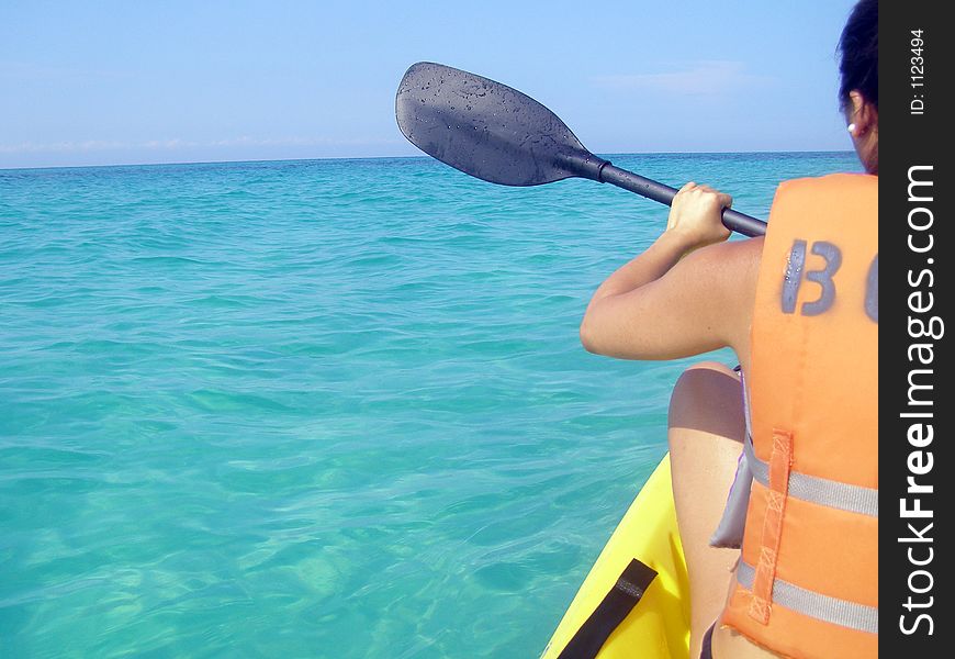 Kayaker on open water in the Gulf of Mexico. Kayaker on open water in the Gulf of Mexico.