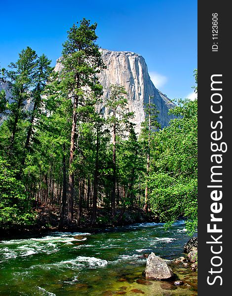 El Capitan is a 3,000 foot vertical rock formation in Yosemite Valley and Yosemite National Park. It is one of the most popular monoliths with rock climbers in the world. El Capitan is a 3,000 foot vertical rock formation in Yosemite Valley and Yosemite National Park. It is one of the most popular monoliths with rock climbers in the world.