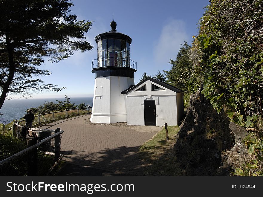 View of the Cape Meares lighthouse on the Oregon coast. View of the Cape Meares lighthouse on the Oregon coast
