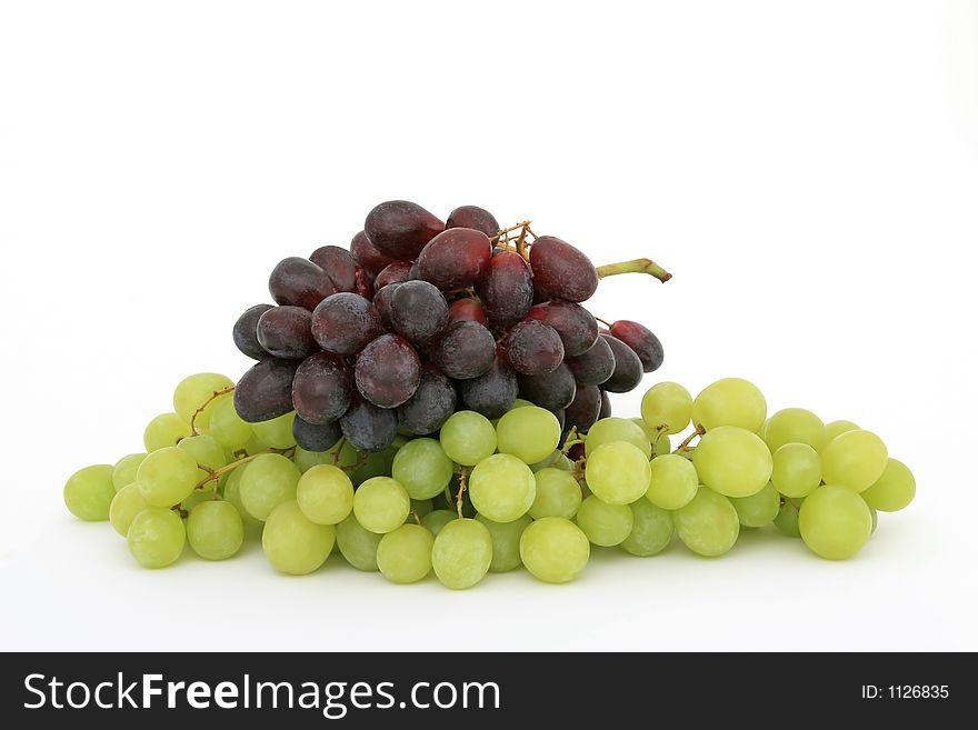 Red and green grapes, isolated on white, copy space