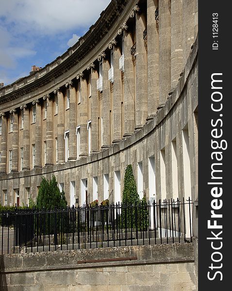 A close view of Royal Crescent in Bath, England. Royal Crescent is a famous row of Georgian town houses. A close view of Royal Crescent in Bath, England. Royal Crescent is a famous row of Georgian town houses.