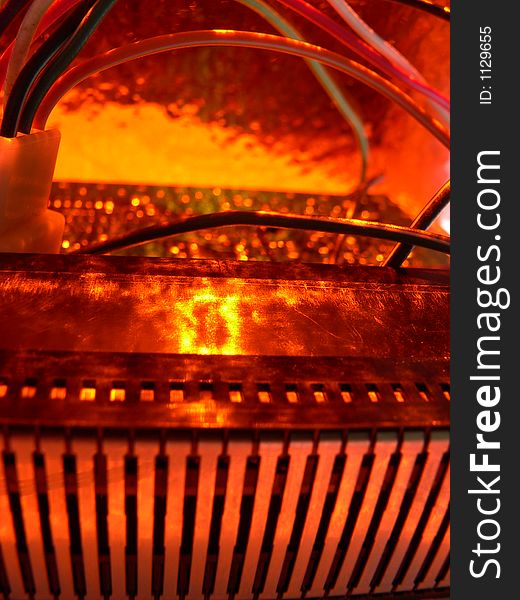 An assortment of technology under a weird orange fiery haze. Some of the circuit boards, wires, and other assorted equipment used range from vintage and retro to modern. An assortment of technology under a weird orange fiery haze. Some of the circuit boards, wires, and other assorted equipment used range from vintage and retro to modern.