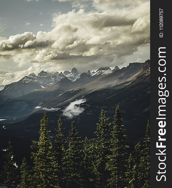 Gray Mountains Under Gray Sky At Daytime