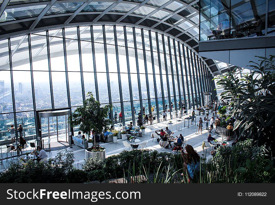 Landscape Photo of People Inside Building