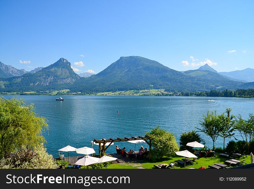 Lake and Mountain Under Blue Sky and White Clouds View Aerial Photography