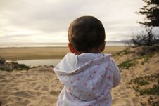 Baby Playing On The Beach. Stock Photos