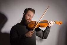 Art And Artist. Young Emotional Man Violinist Fiddler Playing V Royalty Free Stock Image