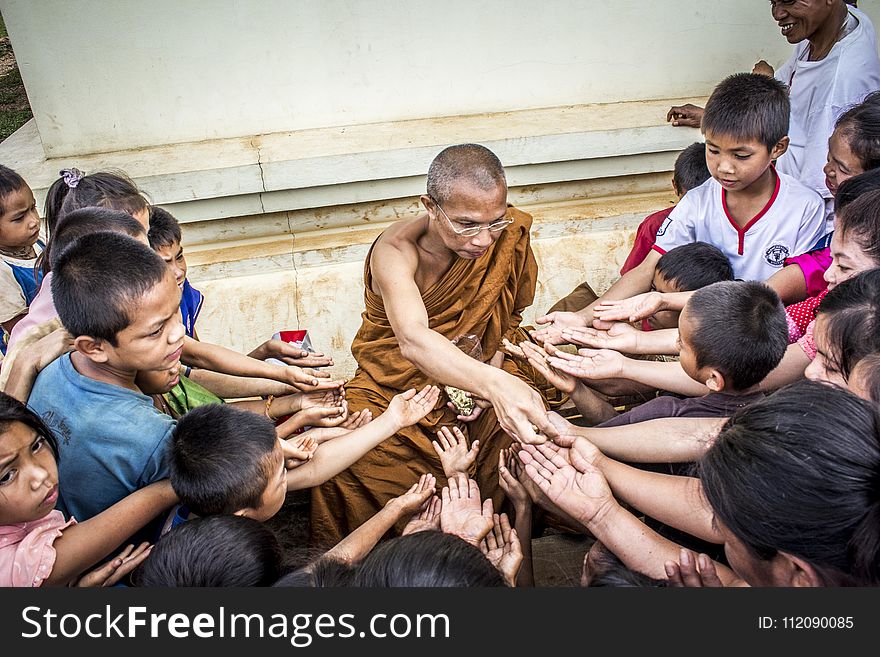 Group of People Lending Their Hands