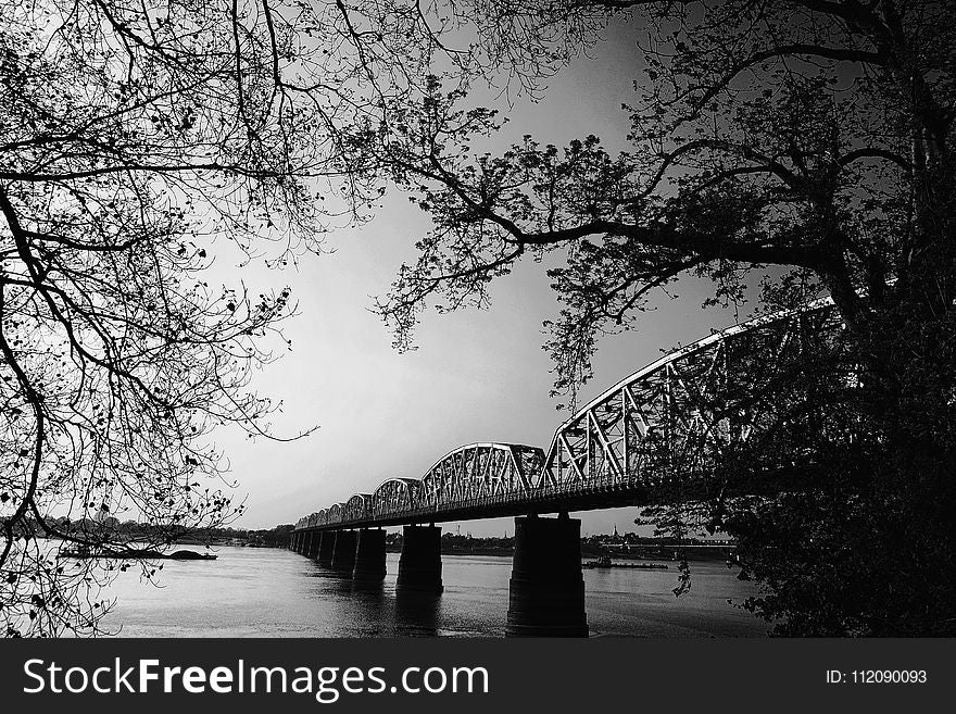 Black and Gray Scale Photo of Bridge