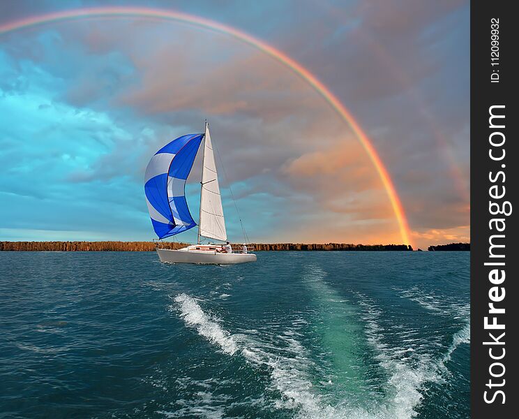 Sailboats on the beautiful Lake of the Southern Ural of Russia.Yacht and beautiful seascape. Sailboats on the beautiful Lake of the Southern Ural of Russia.Yacht and beautiful seascape.