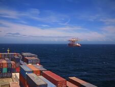 Big Container Vessel Passing Special Crane Transport Vessel Stock Photography