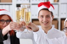 A Group Of Businesspeople Celebrating Christmas Stock Images