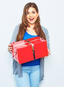 Surprising Woman Hold Big Gift Box. Royalty Free Stock Photos