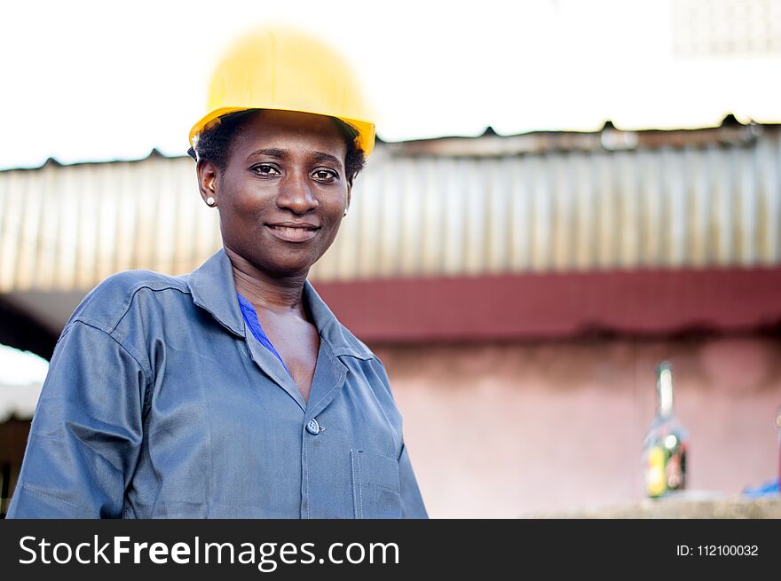 Portrait Of A Smiling Worker Looking At The Camera.