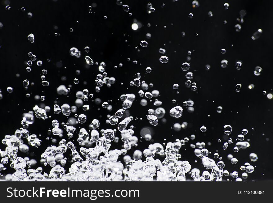 Water splash on black background