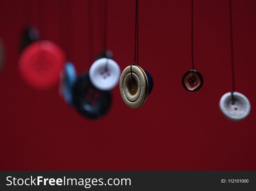 Buttons Against A Red Background