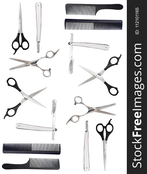 Comb with scissors and razor on a white background .