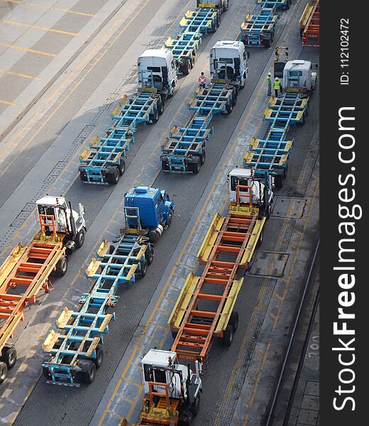 Trucks used for container transport waiting at the terminal for cargo. Trucks used for container transport waiting at the terminal for cargo.