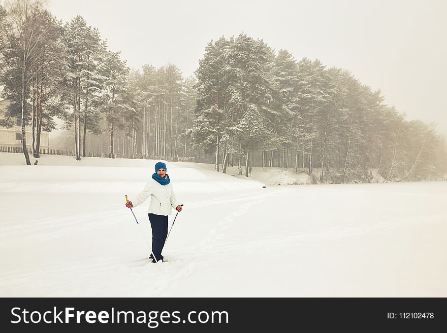 Belarus, Grodno, Lake Molochnoe In The Winter. People Skiing.