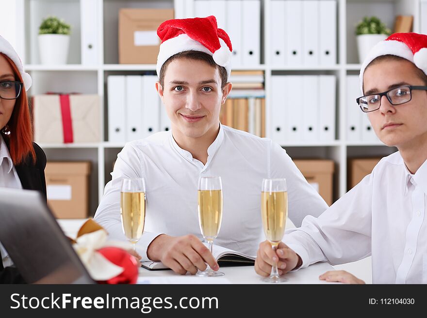 A Group Of Businesspeople Celebrating Christmas