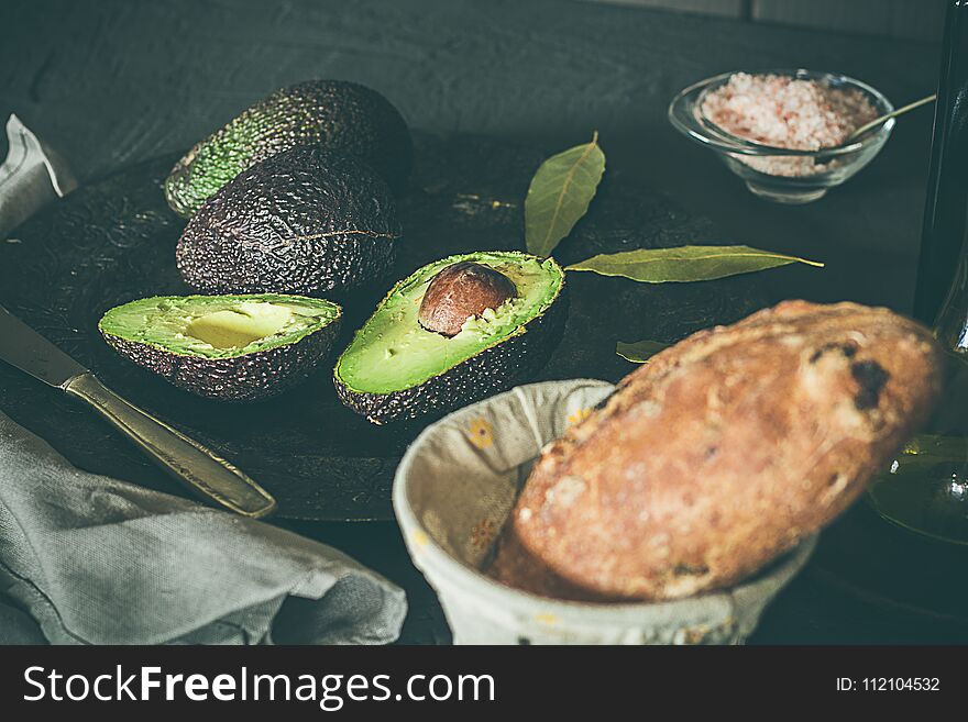 Avocados with bread and olive oil