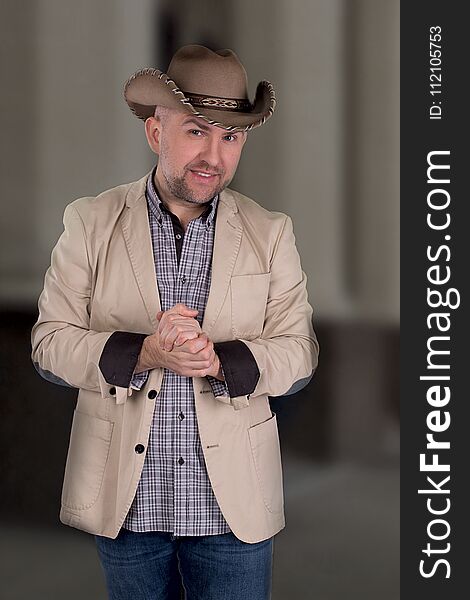 The Man`s Portrait In A Cowboy`s Hat.