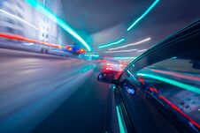 View From Side Of Car Moving In A Night City Royalty Free Stock Photography