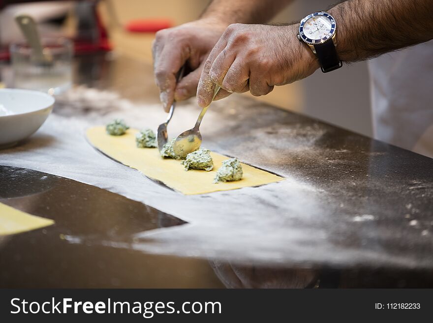 Man making ravioli,italian cuisine and gluten-free