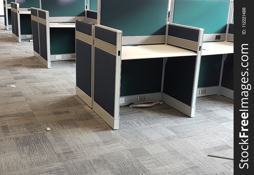 individual working stations in dark green with grey