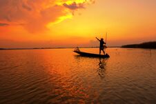 Silhouette Fisherman With Sunset,Take Photo Fisherman Young Woman With Sunset Royalty Free Stock Images