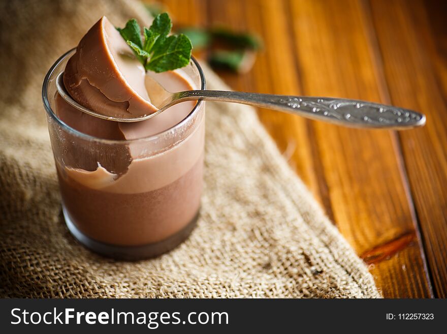 Homemade chocolate mousse in a glass cup