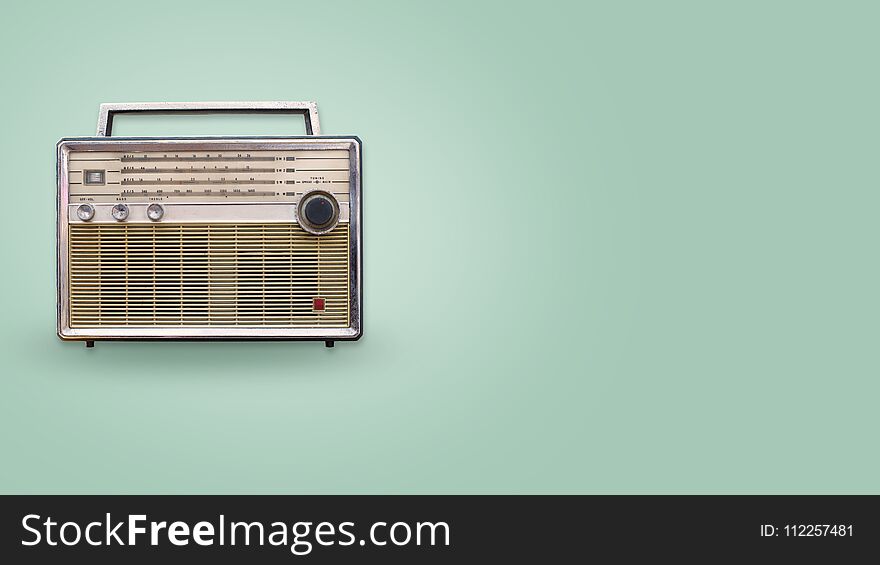 Vintage radio on color background. retro technology. flat lay, top view hero header. vintage color styles.